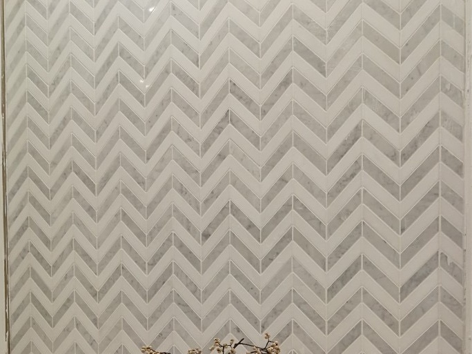 https://www.wanpomosaic.com/decorative-grey-white-carrara-marble-chevron-mosaic-tile-supplier-product/