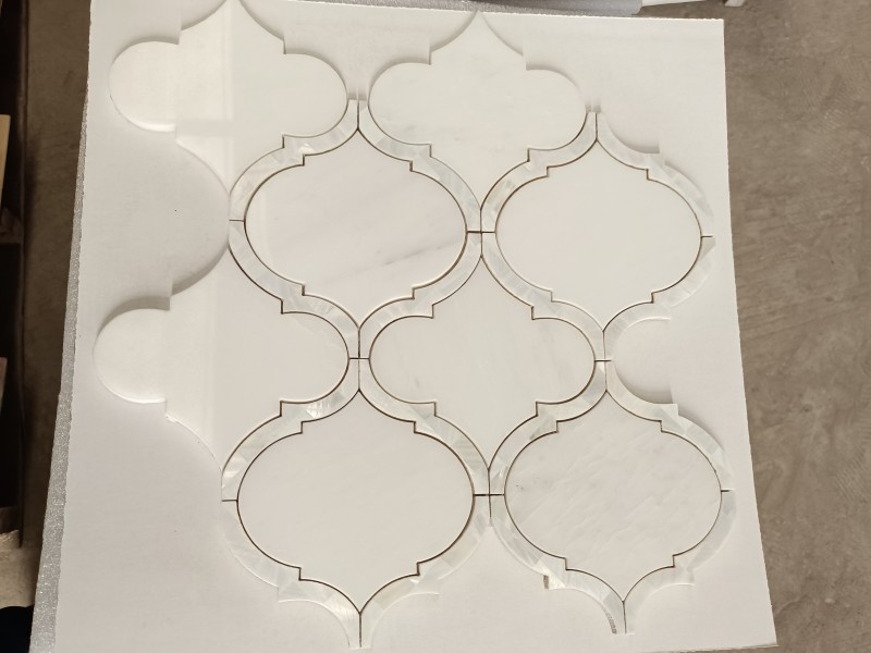 https://www.wanpomosaic.com/elegant-white-aphrodite-mother-of-pearl-waterjet-marble-mosaic-supply-product/