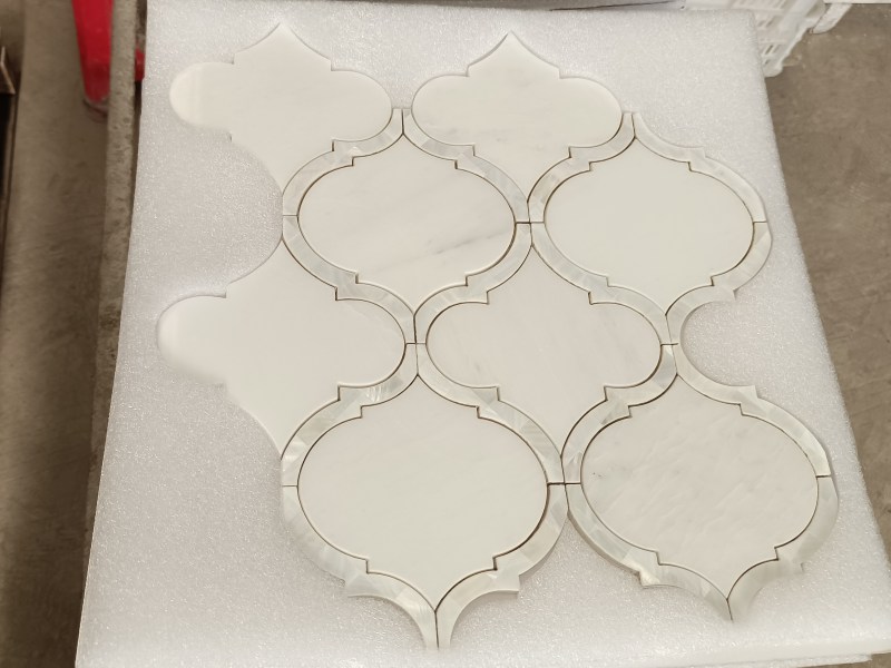 https://www.wanpomosaic.com/elegant-white-aphrodite-mother-of-pearl-waterjet-marble-mosaic-supply-product/