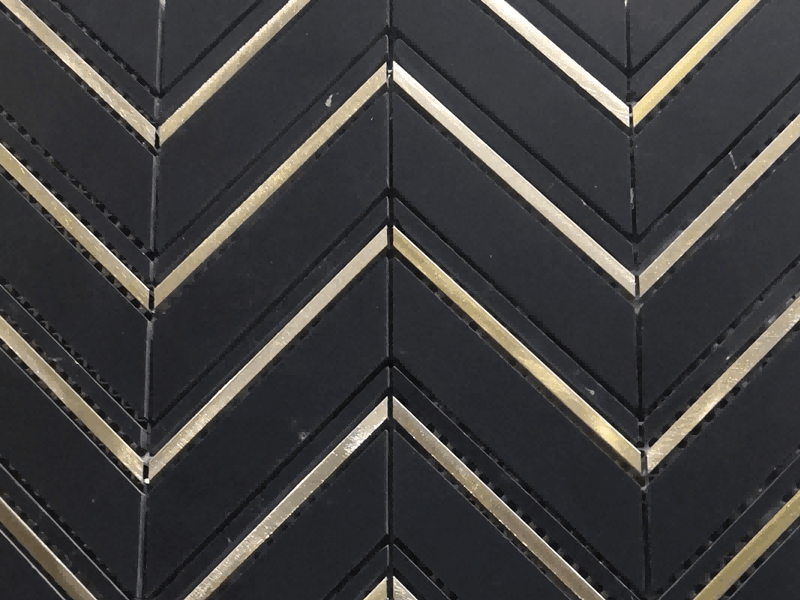 https://www.wanpomosaic.com/nero-marquina-chevron-tile-pattern-kitchen-metal-inlay-marble-supplier-product/