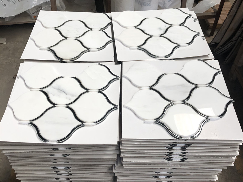 https://www.wanpomosaic.com/waterjet-stone-mosaic-white-marble-arabesque-tile-for-wall-decor-product/