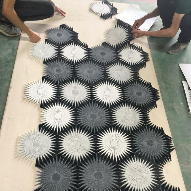 https://www.wanpomosaic.com/new-pattern-sunflower-tile-black-and-white-marble-mosaic-made-in-china-product/