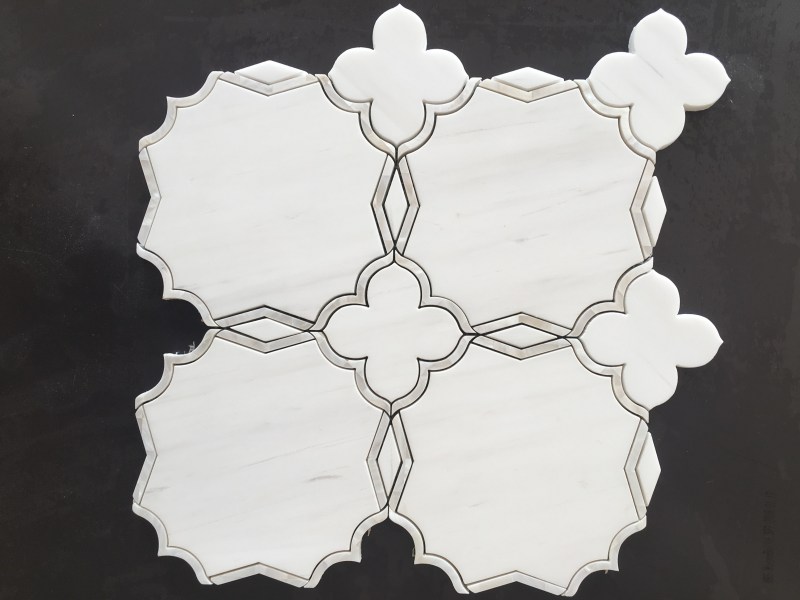 https://www.wanpomosaic.com/hot-sell-dolomite-marble-with-mother-of-pearl-waterjet-tile-for-wall-product/