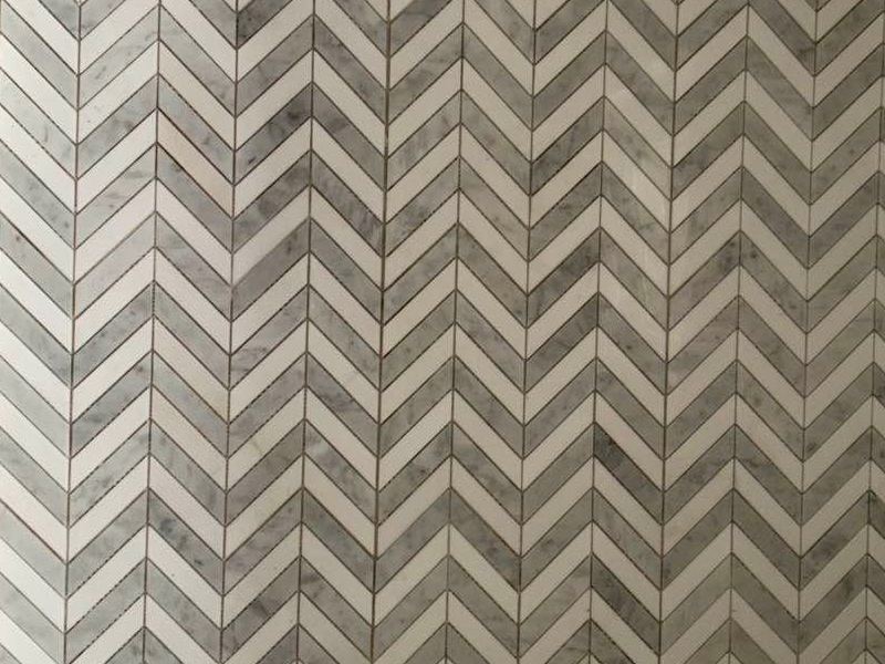 https://www.wanpomosaic.com/decorative-grey-white-carrara-marble-chevron-mosaic-tile-supplier-product/