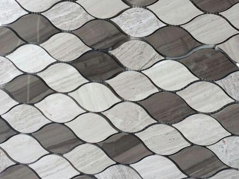 https://www.wanpomosaic.com/factory-price-leaf-stone-mosaic-china-wooden-marble-waterjet-tiles-product/