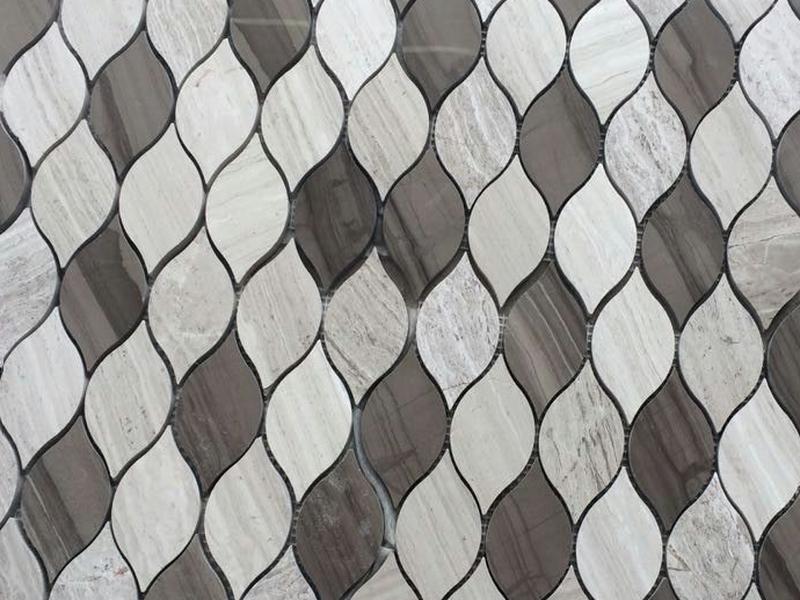 https://www.wanpomosaic.com/factory-price-leaf-stone-mosaic-china-wooden-marble-waterjet-tiles-product/