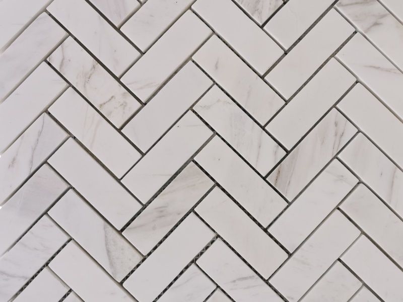 https://www.wanpomosaic.com/wholesale-herringbone-marble-tiles-kitchen-white-stone-mosaics-product/