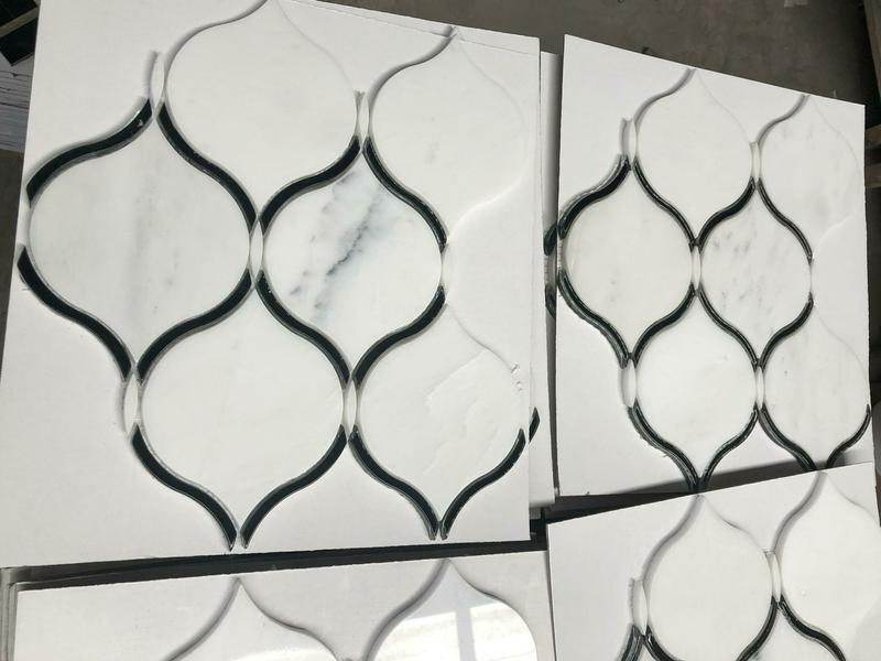 https://www.wanpomosaic.com/waterjet-stone-mosaic-white-marble-arabesque-tile-for-wall-decor-product/