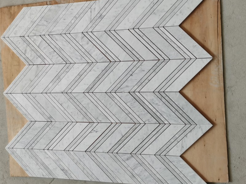 https://www.wanpomosaic.com/wholesale-white-carrara-big-chevron-marble-mosaic-tile-backsplash-product/